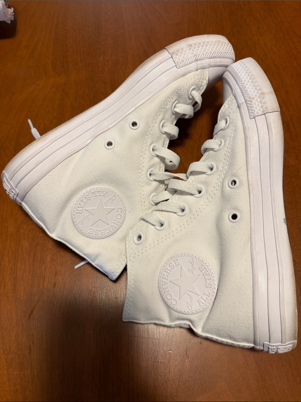 Woman’s Converse White High Top Canvas Sneakers